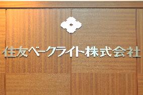 Sumitomo Bakelite signboard and logo